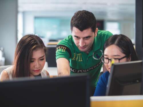 photo of international students at a computer by Mimi Thian for Gasparian Spivey Immigration